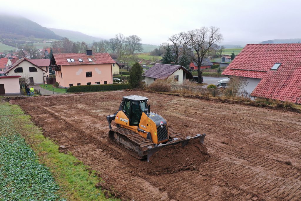 Baufahrzeug der Eichsfelder Firma Spitzenberg Bau bei Erdarbeiten
